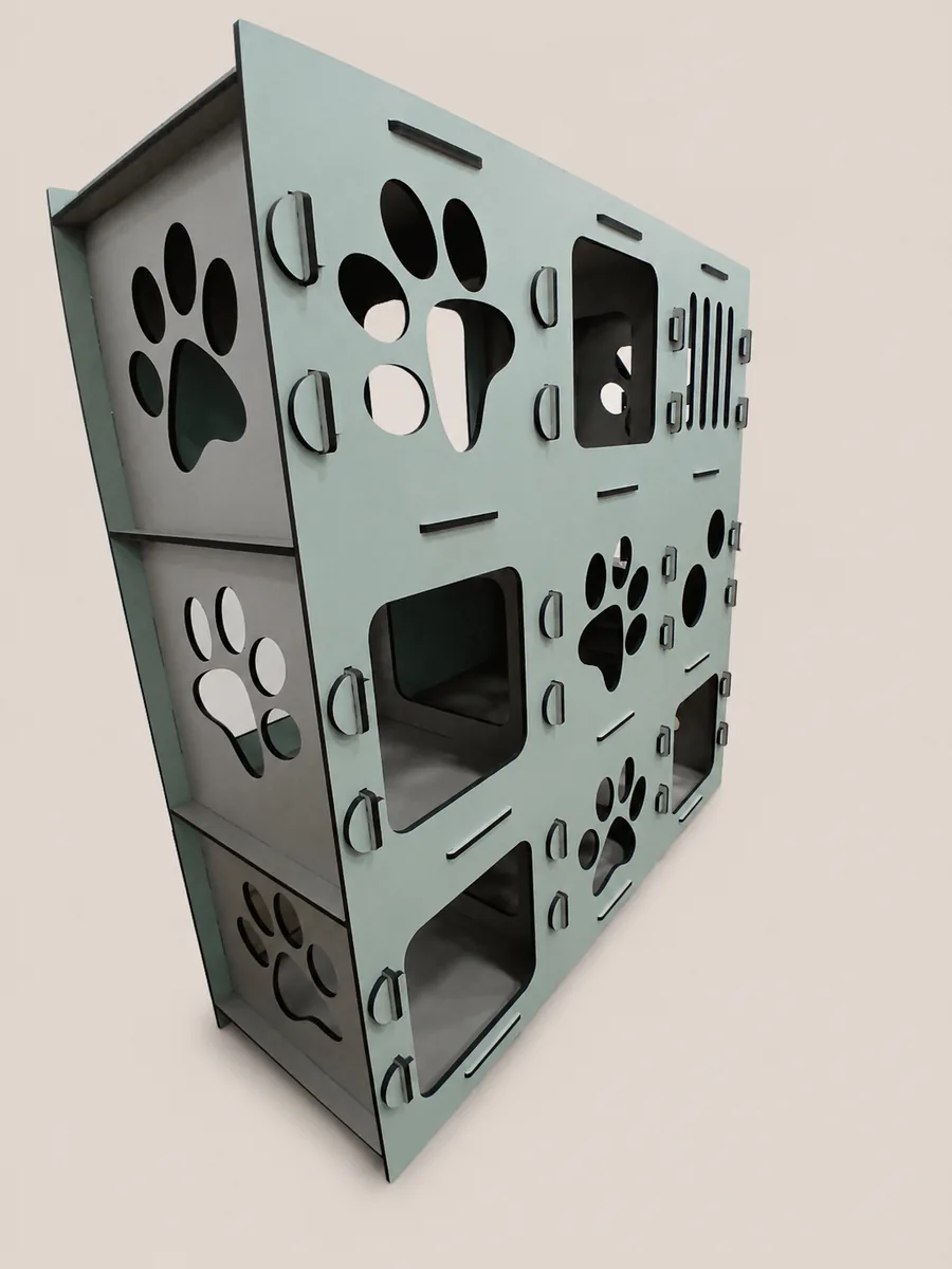Playground modular para gatos verde com nichos e recortes de patinhas, vista lateral